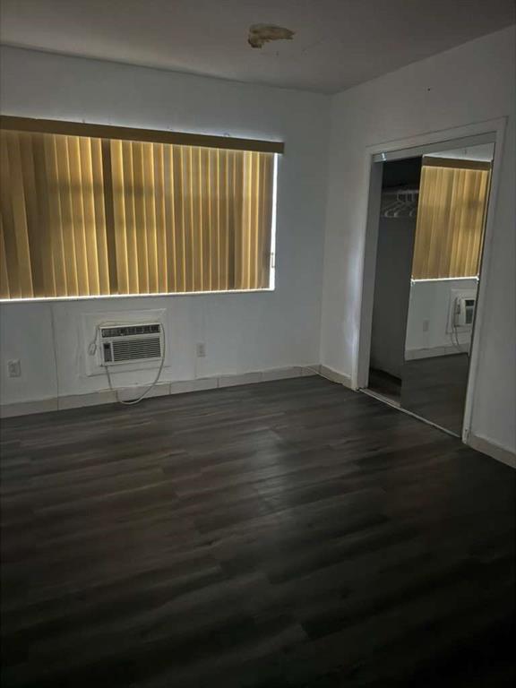 750 83rd Street, Unit 3 Miami Beach, FL 33141 - Photo 29 of 31 a view of wooden floor and brick walls