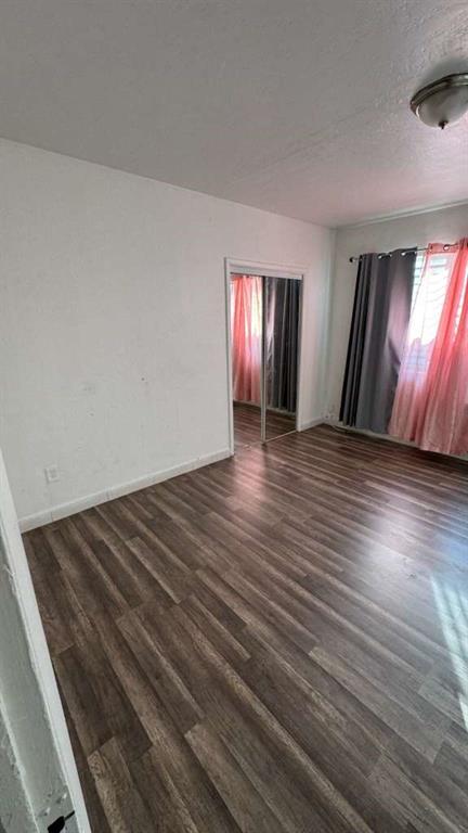 750 83rd Street, Unit 3 Miami Beach, FL 33141 - Photo 6 of 31 a view of an empty room and wooden floor
