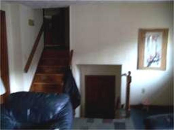 133 Howland Road Freetown, MA 02702 - Photo 11 of 25 a view of entryway and hall with wooden floor