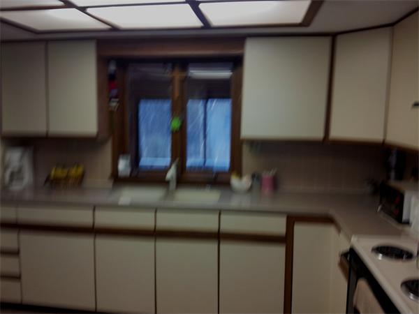 133 Howland Road Freetown, MA 02702 - Photo 18 of 25 a view of cabinets and a stove