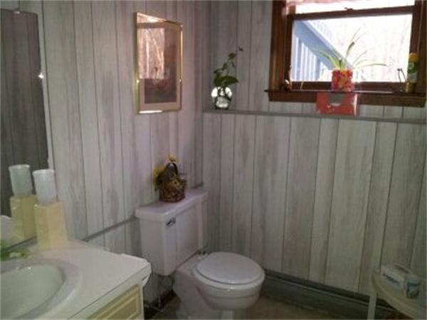 133 Howland Road Freetown, MA 02702 - Photo 23 of 25 a bathroom with a sink a toilet and shower