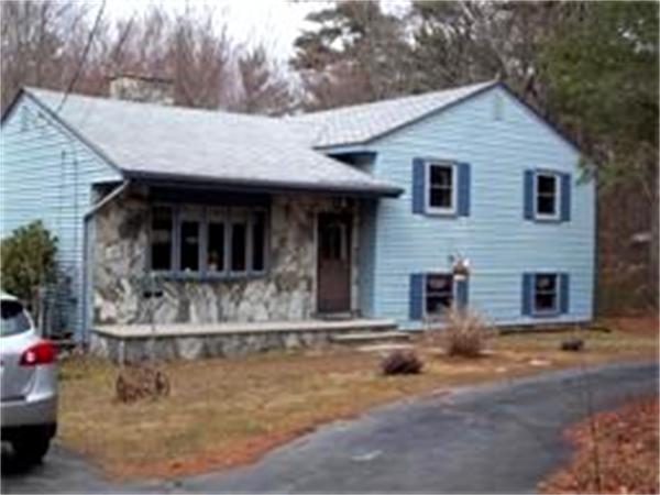 133 Howland Road Freetown, MA 02702 - Photo 3 of 25 a view of a white house with large windows