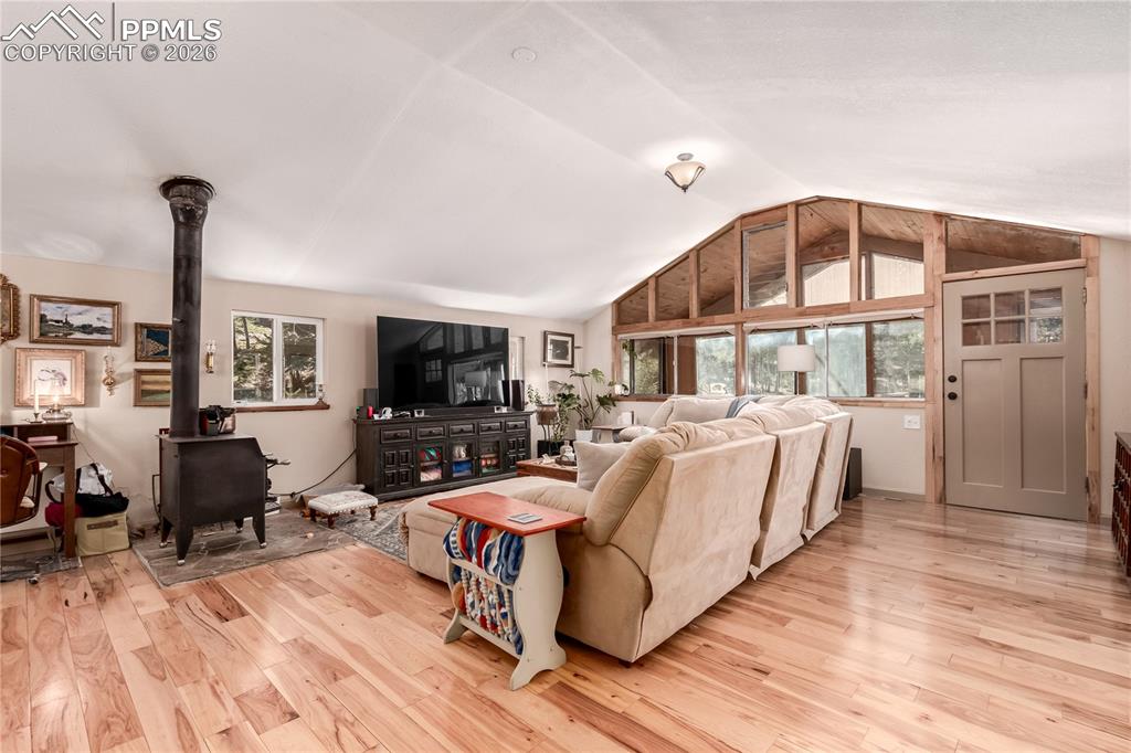 44 Anderson Road Florissant, CO 80816 - Photo 6 of 31 a bed room with furniture and a flat screen tv