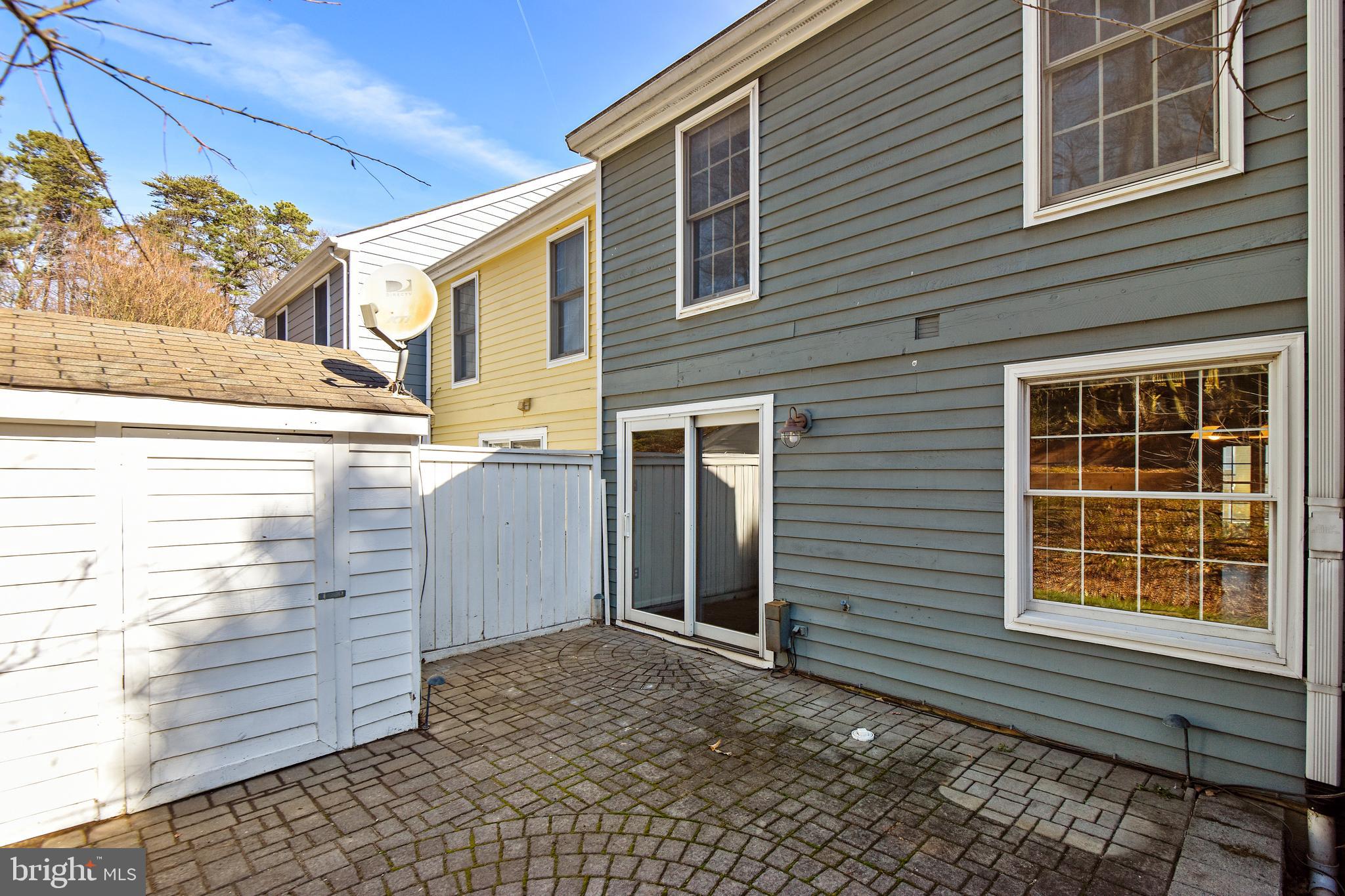 1531 Poplar Grove Drive Reston, VA 20194 - Photo 35 of 36 Outdoor patio with shed for storage