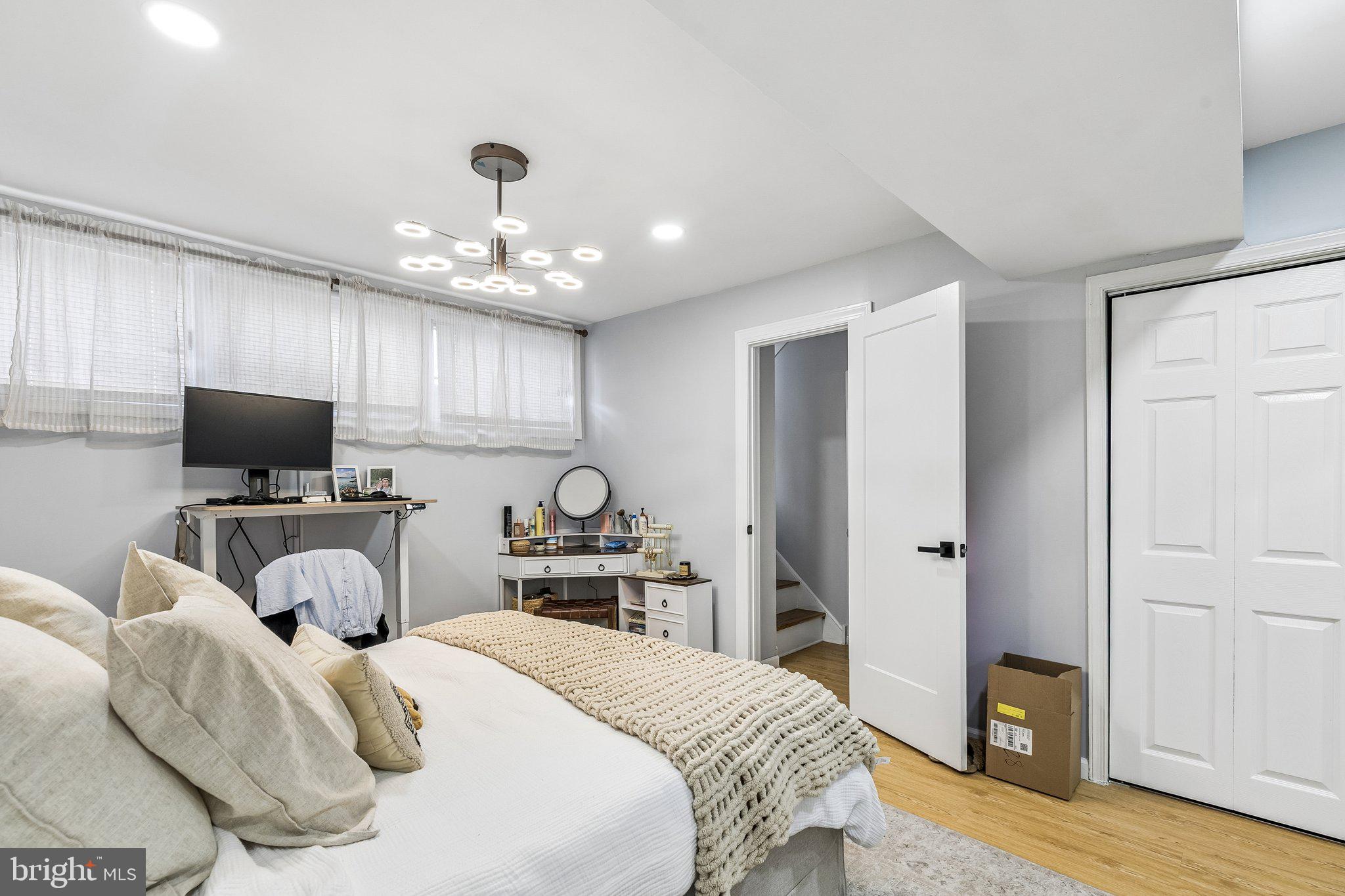 1130 Lombard Street Philadelphia, PA 19147 - Photo 34 of 45 a bedroom with a bed and a television