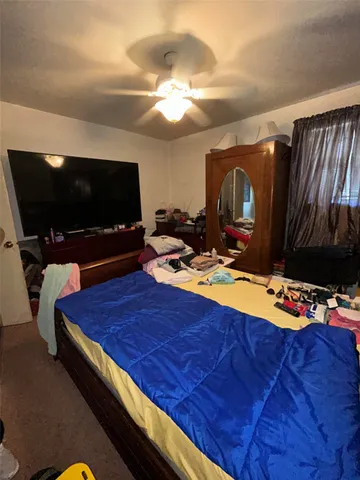 a room with furniture and flat screen tv