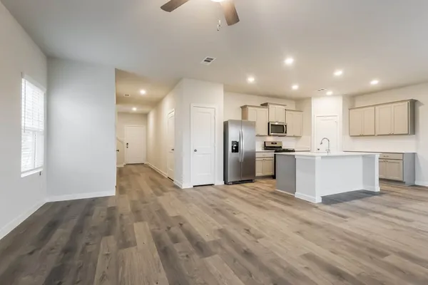 a view of kitchen with wooden floor