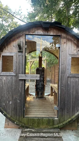 a view of a porch with wooden floor