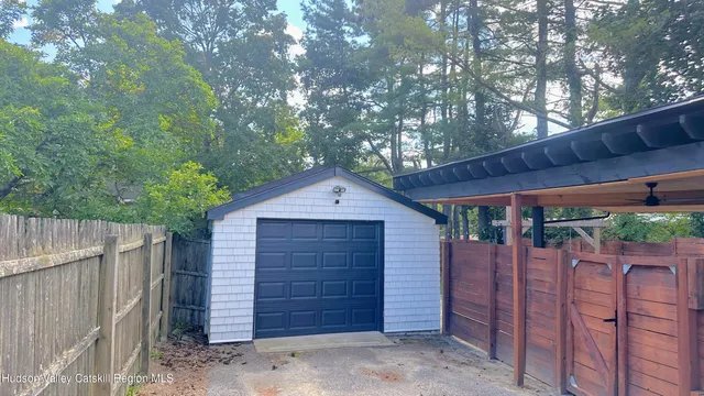 a front view of a house with a garage