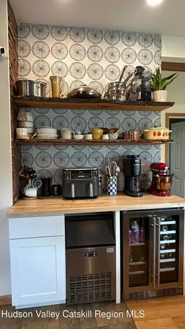 a kitchen with a stove and cabinets