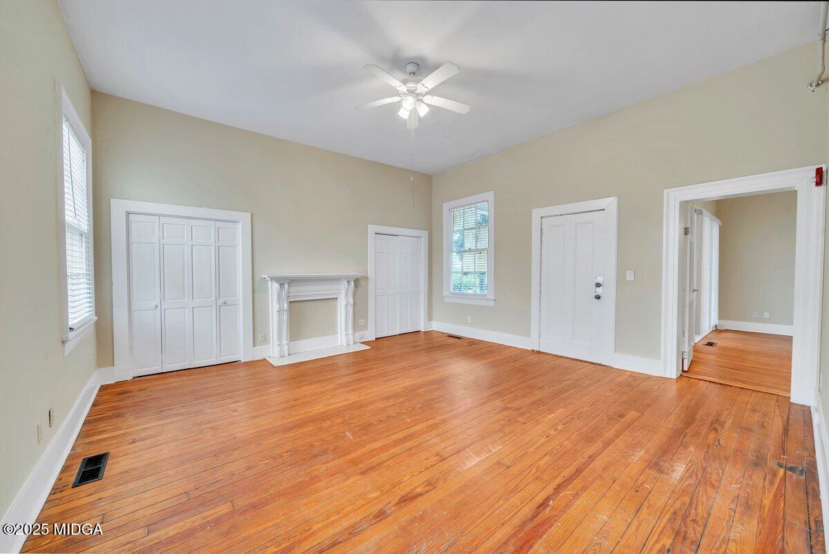 1873 Hardeman Avenue Macon, GA 31201 - Photo 15 of 25 a big room with closet and a ceiling fan