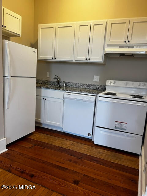 1873 Hardeman Avenue Macon, GA 31201 - Photo 20 of 25 a kitchen with granite countertop white cabinets and a stainless steel appliances