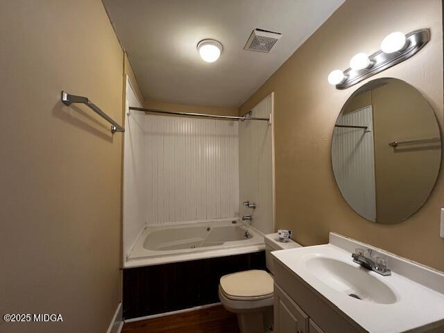 1873 Hardeman Avenue Macon, GA 31201 - Photo 24 of 25 a bathroom with a sink mirror vanity and toilet