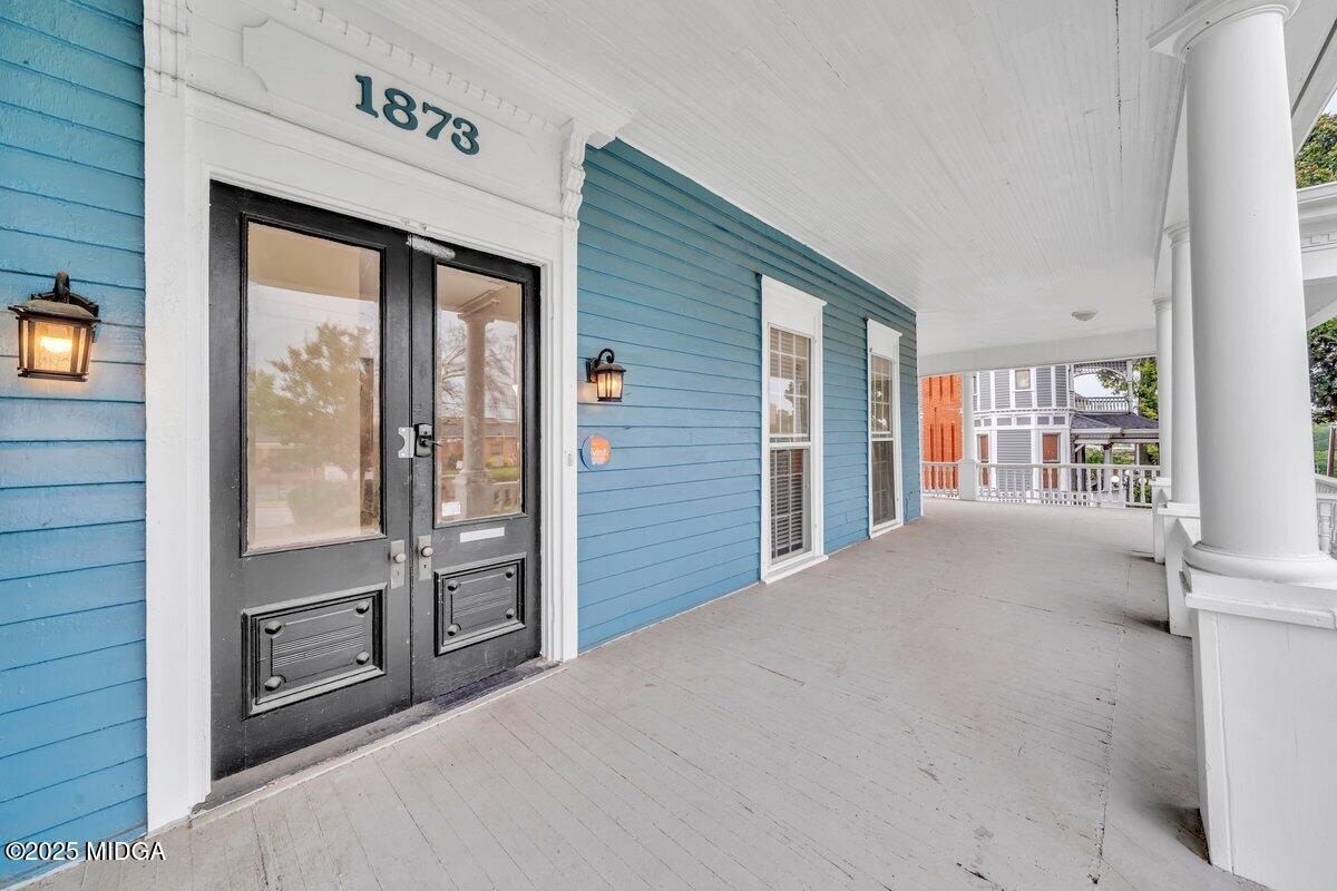 1873 Hardeman Avenue Macon, GA 31201 - Photo 5 of 25 a view of an entryway with a kitchen
