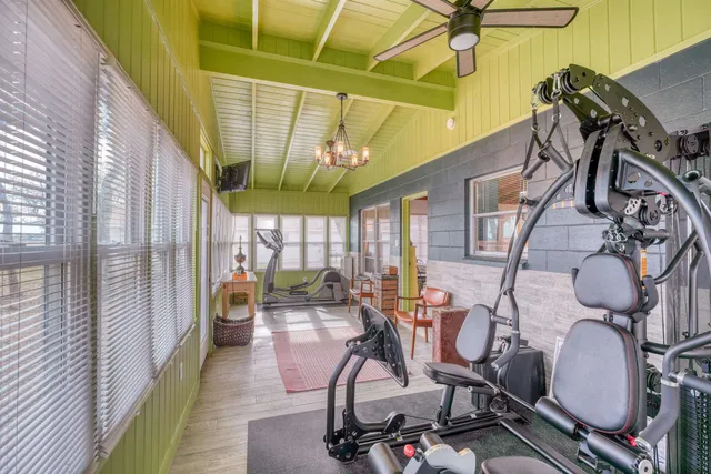 a room with furniture and a flat screen tv