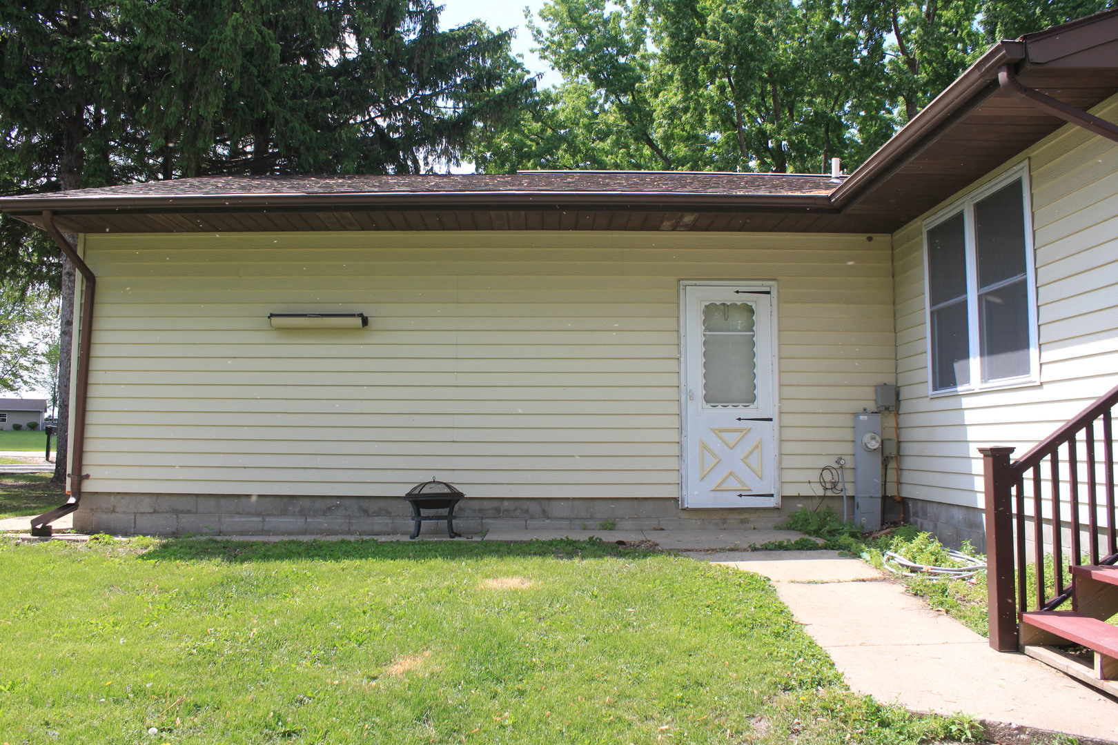 12892 Lawrence Road Sterling, IL 61081 - Photo 15 of 29 a view of outdoor space with deck and yard