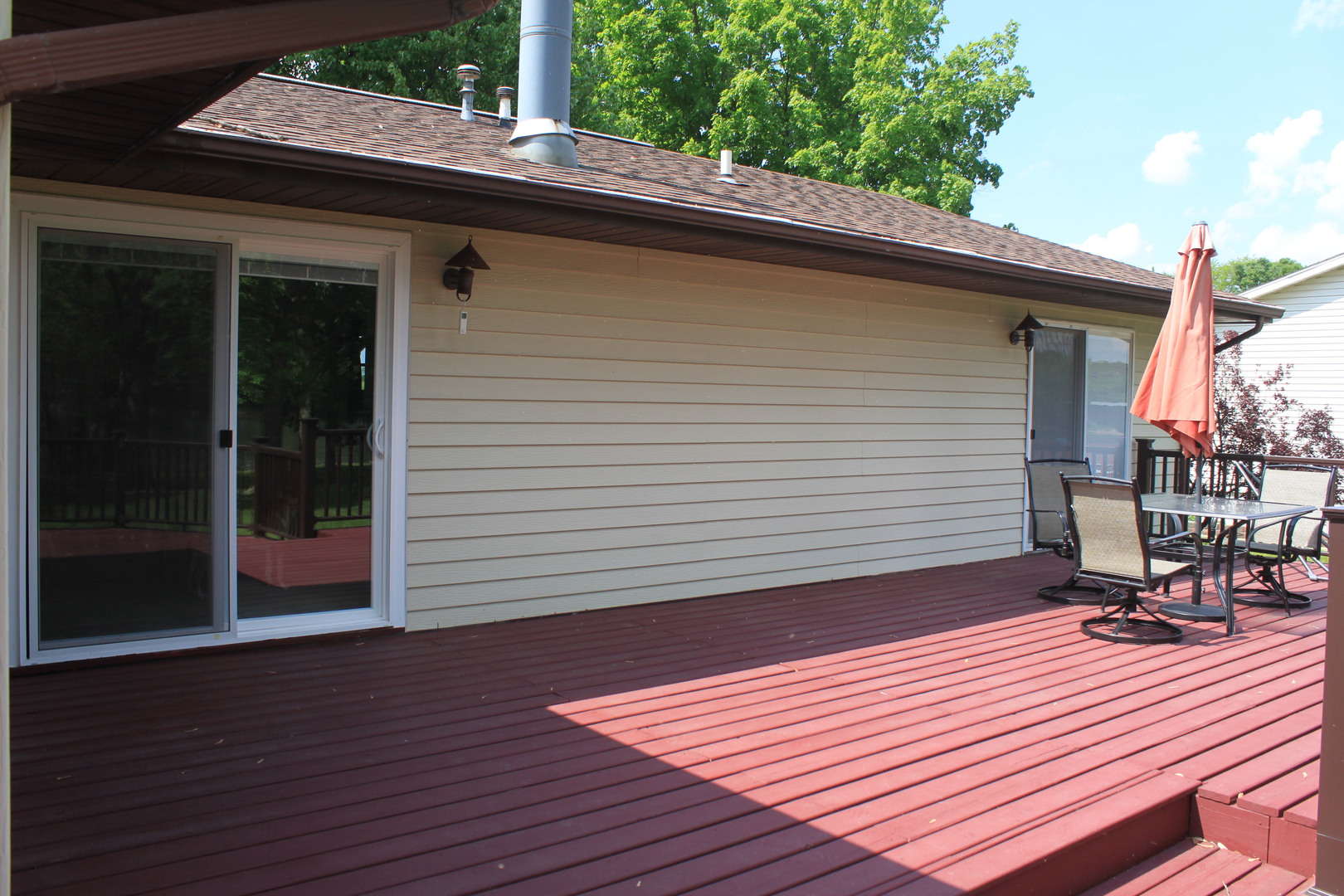 12892 Lawrence Road Sterling, IL 61081 - Photo 16 of 29 a backyard of a house with seating space
