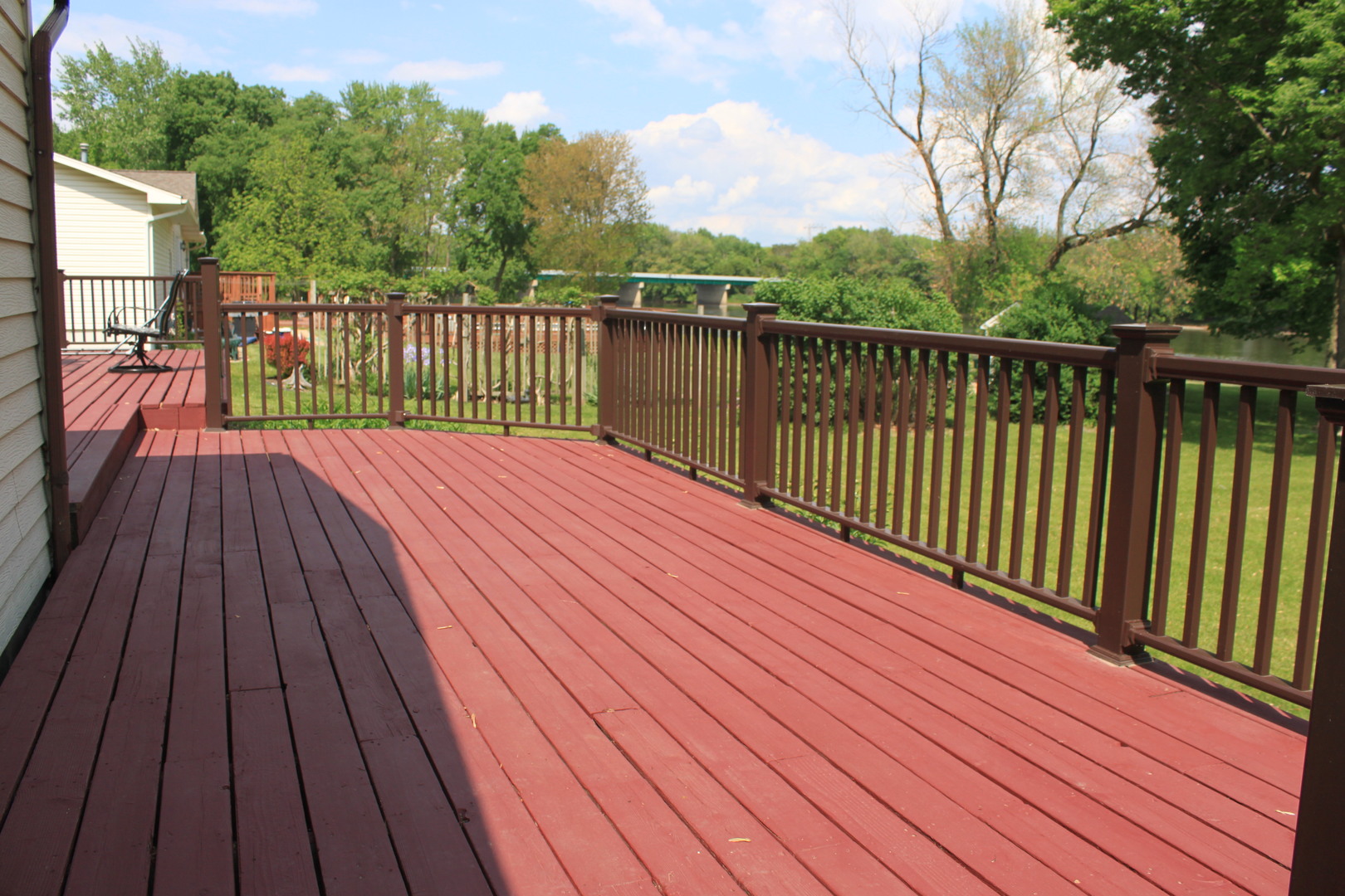 12892 Lawrence Road Sterling, IL 61081 - Photo 18 of 29 a view of deck with wooden floor and fence