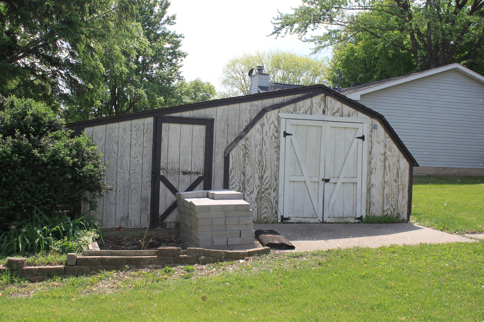 12892 Lawrence Road Sterling, IL 61081 - Photo 22 of 29 a view of backyard with tub and trees