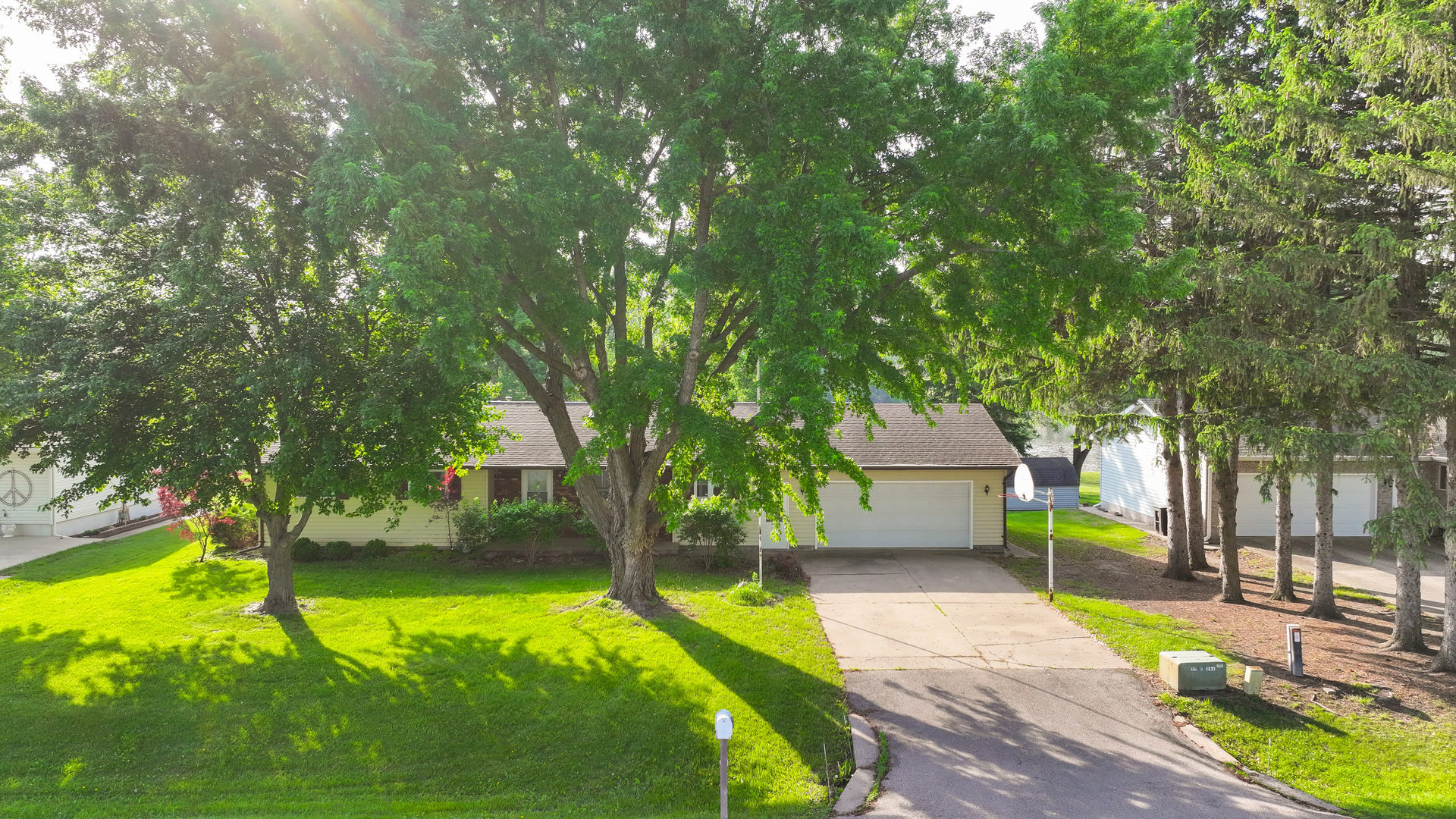 12892 Lawrence Road Sterling, IL 61081 - Photo 23 of 29 a view of a house with swimming pool