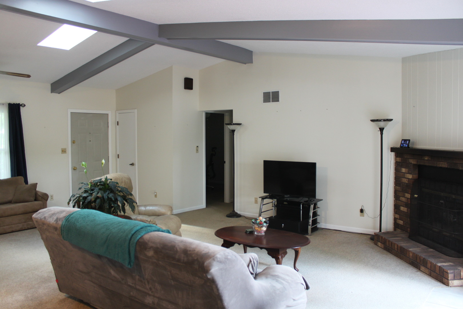 12892 Lawrence Road Sterling, IL 61081 - Photo 3 of 29 a living room with furniture and a flat screen tv