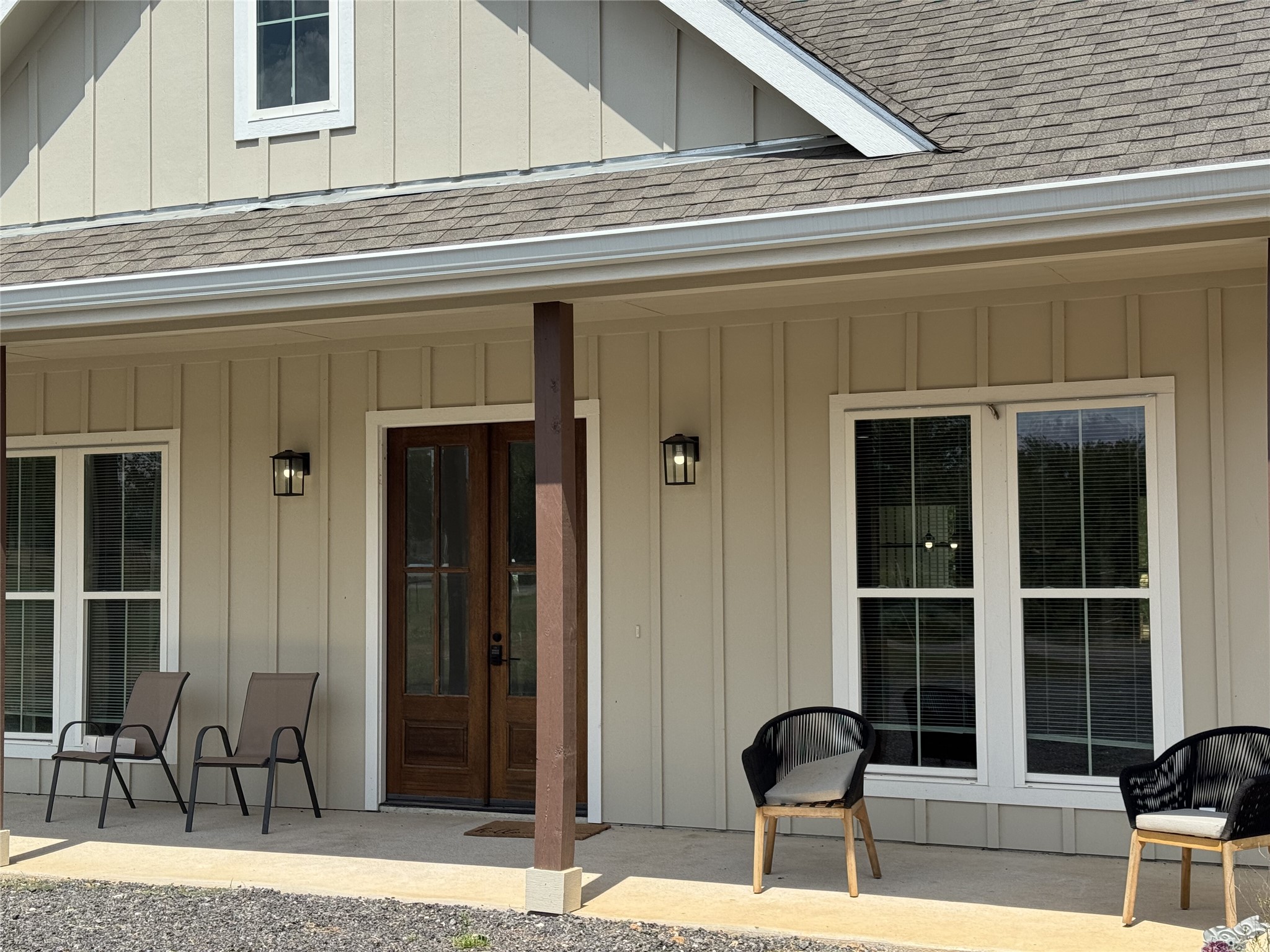 1353 Red Town Road, Unit B Elgin, TX 78621 - Photo 25 of 26 Double entry doors and board-and-batten siding define this welcoming front porch.