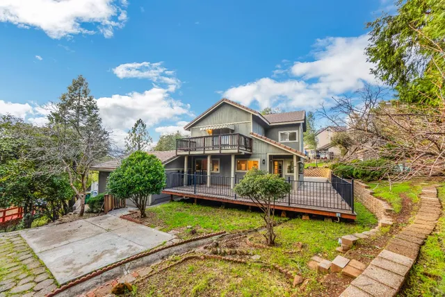 a view of a house with a deck