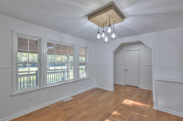 a view of an empty room and window