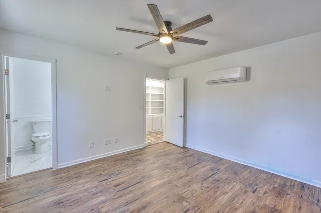 a view of a swimming pool with a yard and outdoor seating