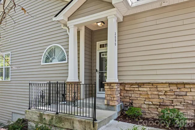 a view of a house with a porch