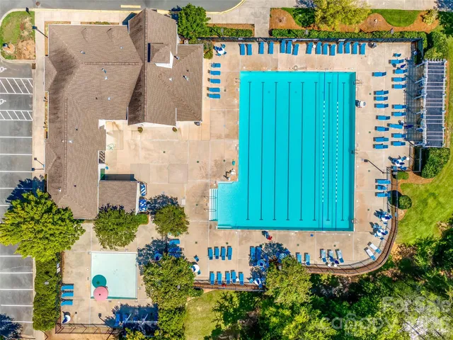 an aerial view of a house with a garden