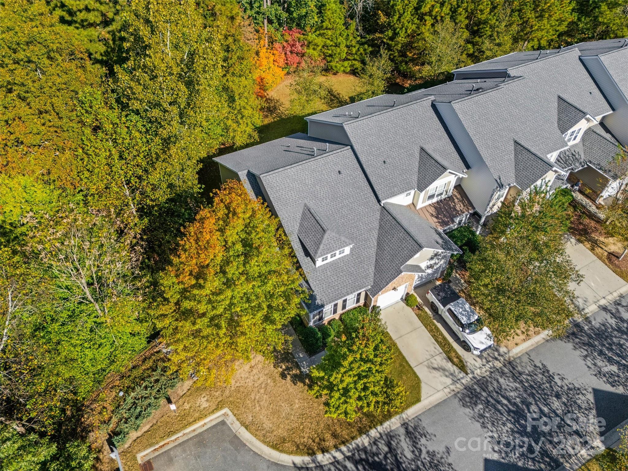 2090 Calloway Pines Drive Tega Cay, SC 29708 - Photo 34 of 38 an aerial view of a house with a yard