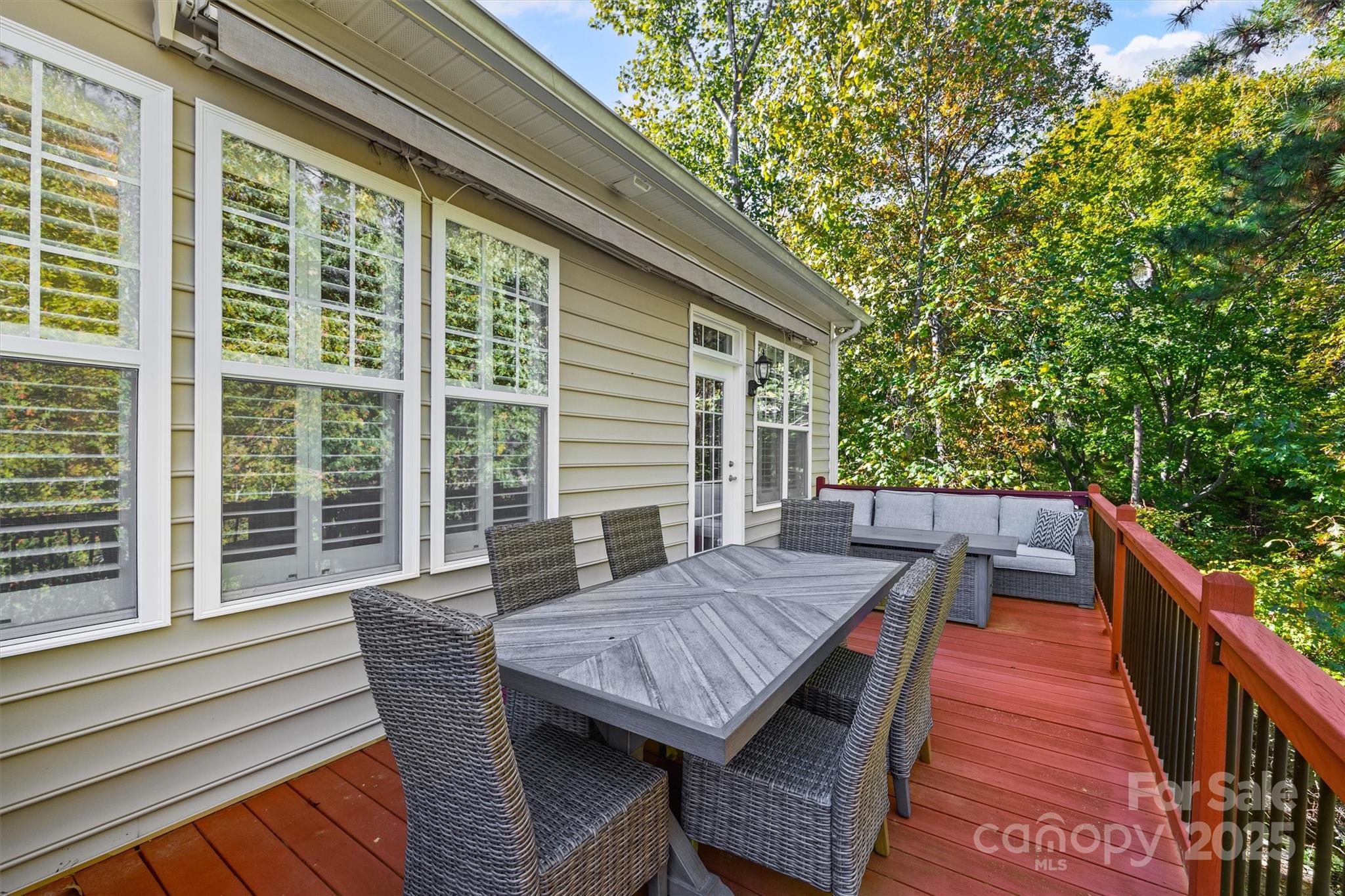 2090 Calloway Pines Drive Tega Cay, SC 29708 - Photo 35 of 38 a balcony with wooden floor and fence