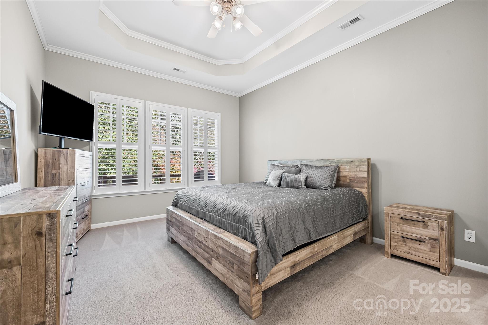 2090 Calloway Pines Drive Tega Cay, SC 29708 - Photo 10 of 38 a bed room with a bed and a television