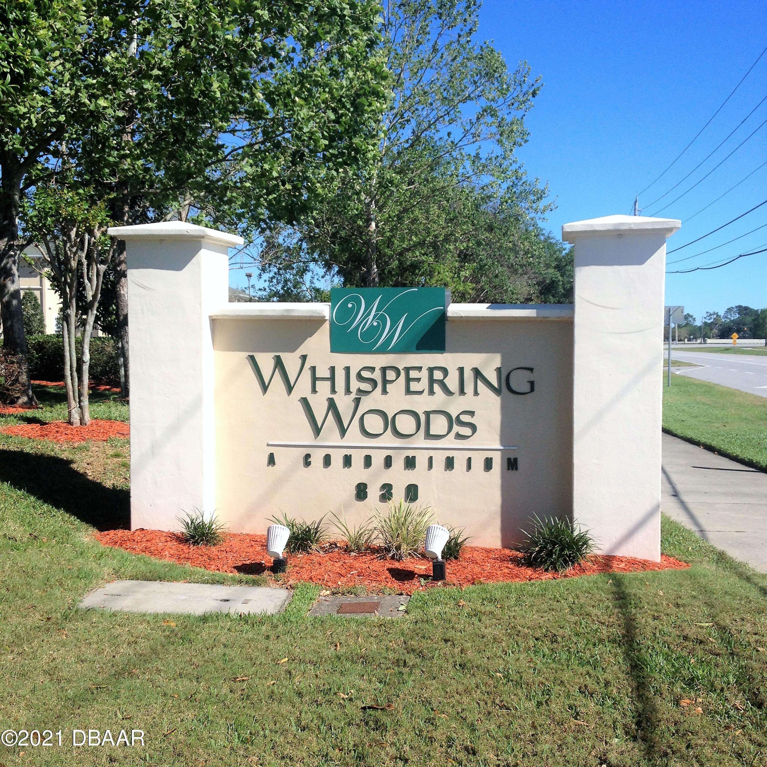 830 Airport Road, Unit 711 Port Orange, FL 32128 - Photo 1 of 47 a sign on the side of the road