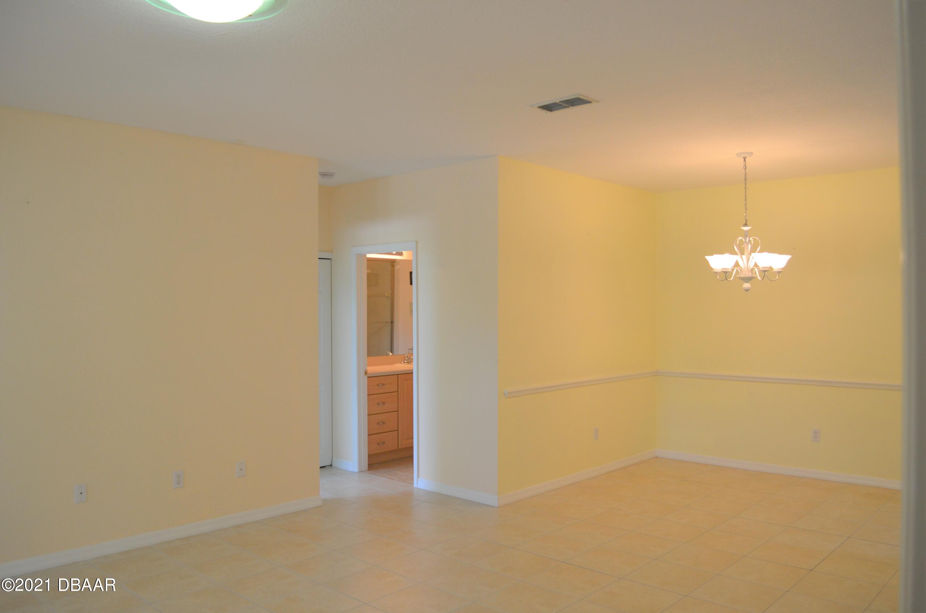 830 Airport Road, Unit 711 Port Orange, FL 32128 - Photo 25 of 47 a view of empty room