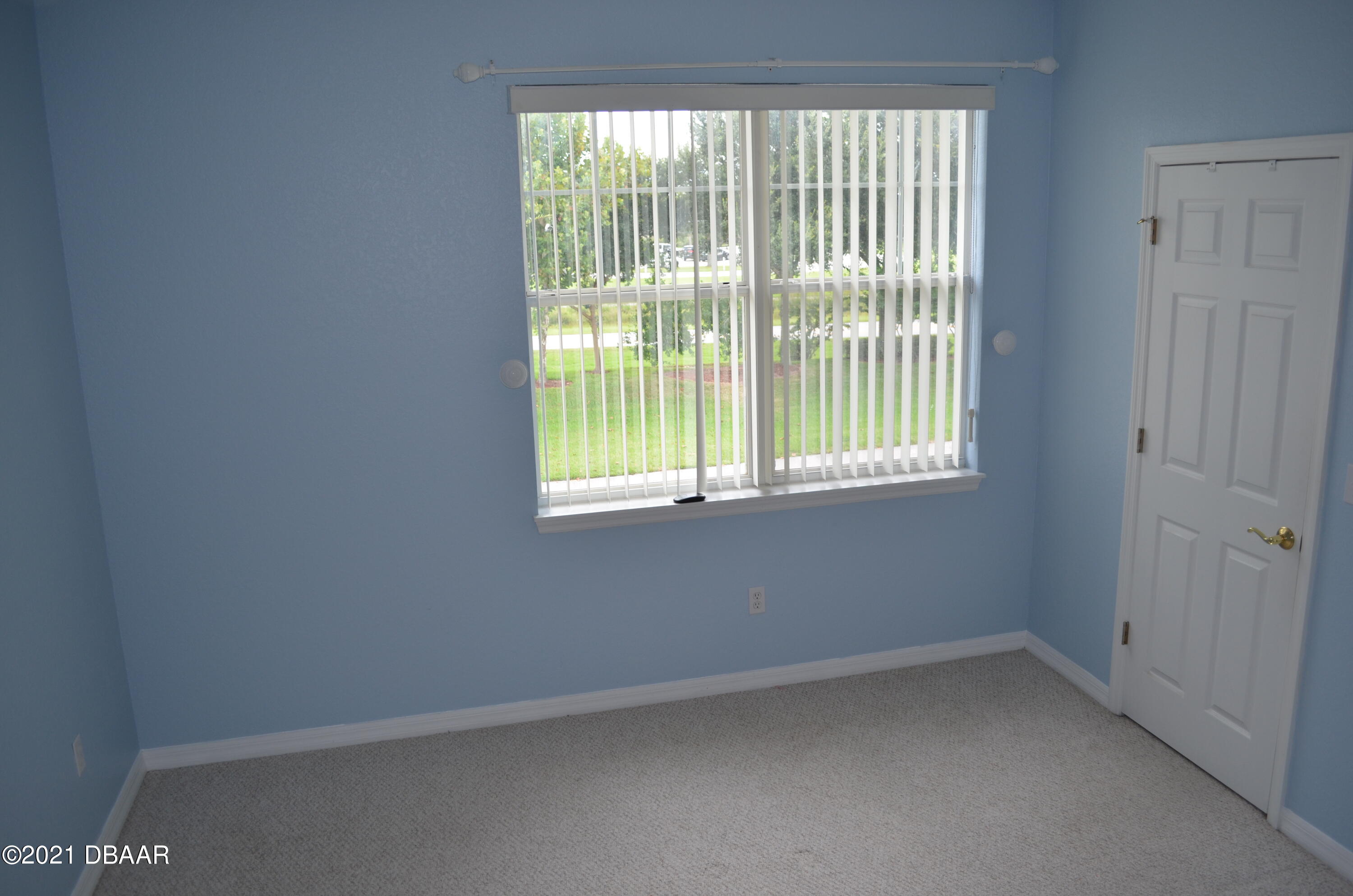 830 Airport Road, Unit 711 Port Orange, FL 32128 - Photo 28 of 47 a view of an empty room with a window