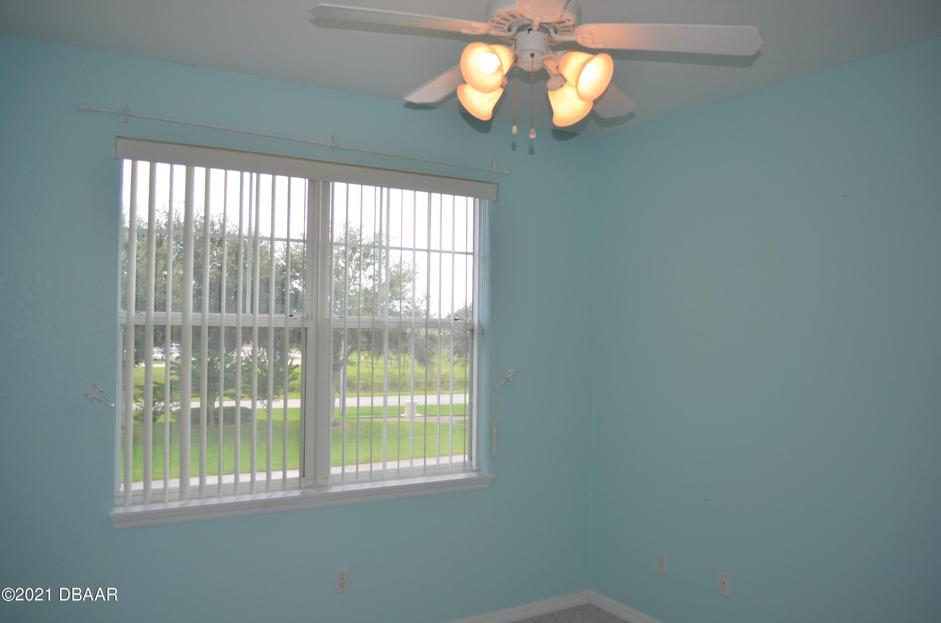 830 Airport Road, Unit 711 Port Orange, FL 32128 - Photo 36 of 47 a view of a room with a window