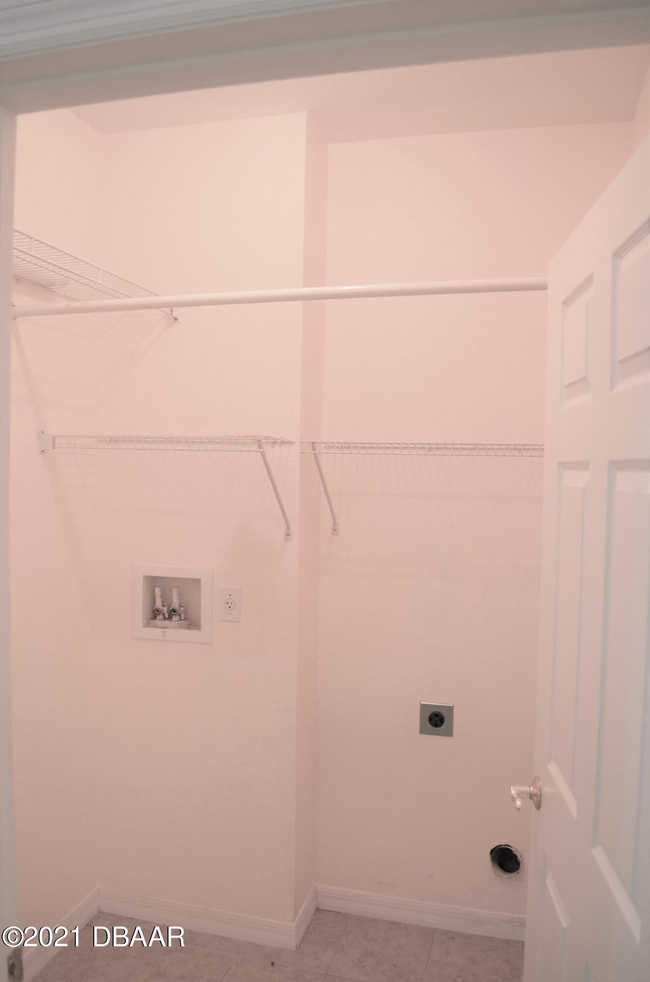 830 Airport Road, Unit 711 Port Orange, FL 32128 - Photo 42 of 47 a bathroom with a shower