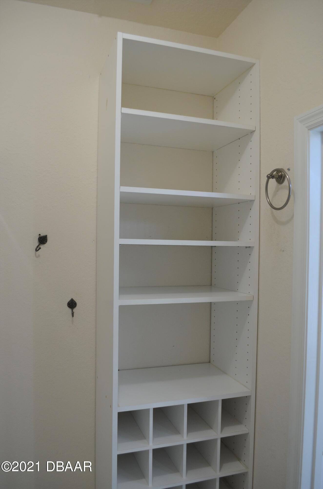 830 Airport Road, Unit 711 Port Orange, FL 32128 - Photo 6 of 47 a view of a walk in closet