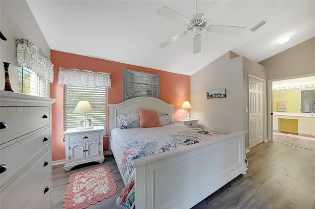 a bedroom with a bed and a cabinets