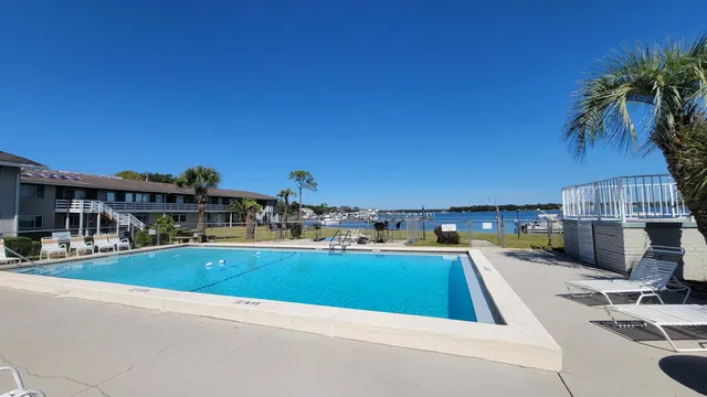 a view of a swimming pool with a patio