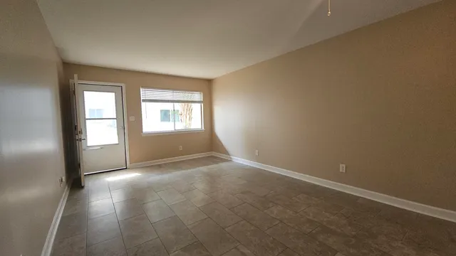 an empty room with windows