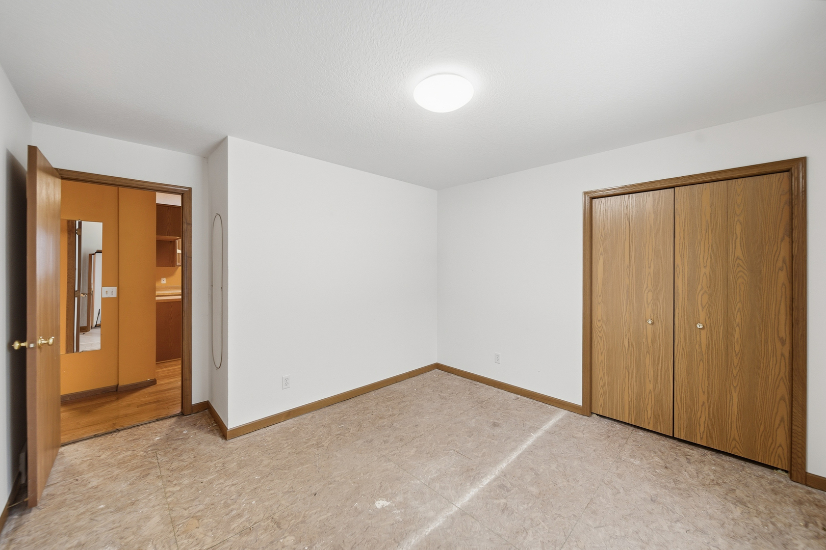 678 Pheasant Run Dixon, IL 61021 - Photo 11 of 29 an empty room with closet area