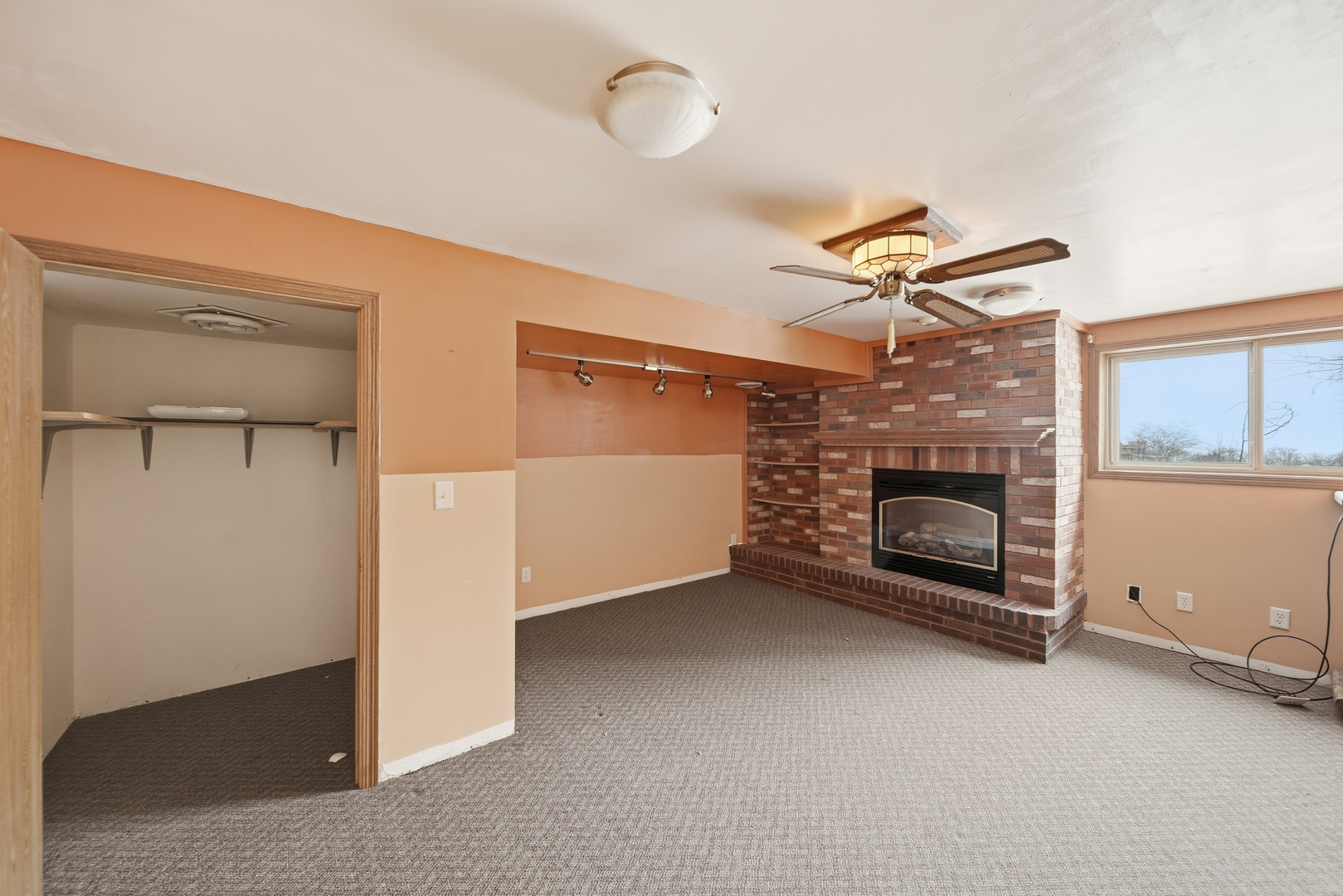 678 Pheasant Run Dixon, IL 61021 - Photo 17 of 29 a view of empty room with fireplace and fan