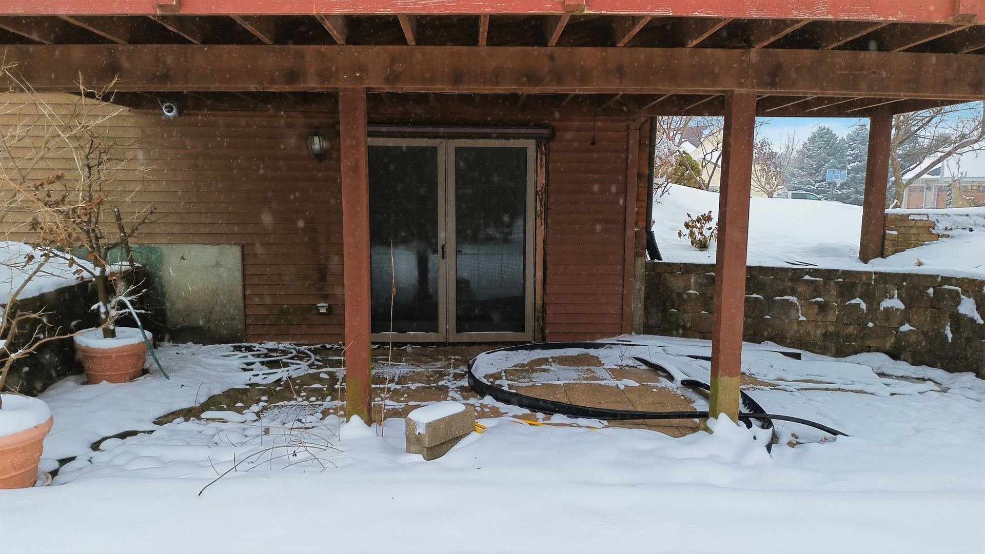 678 Pheasant Run Dixon, IL 61021 - Photo 24 of 29 a building outdoor space with patio furniture and potted plants