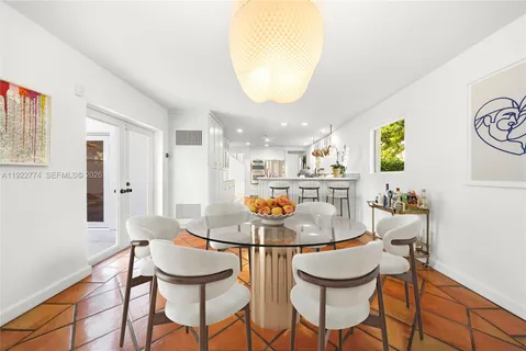 a spacious bedroom with a bed and a window