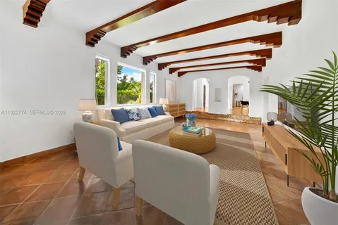 a kitchen with a sink cabinets and window