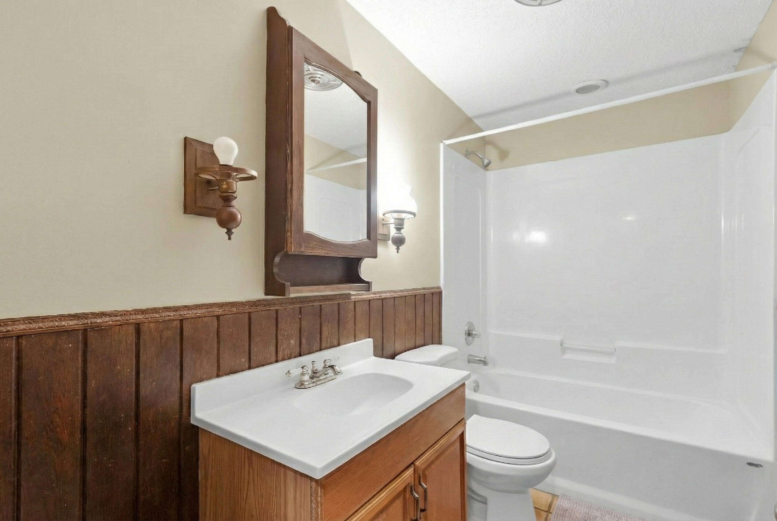 1614 Dennis Street Key West, FL 33040 - Photo 26 of 59 a bathroom with a sink toilet and shower