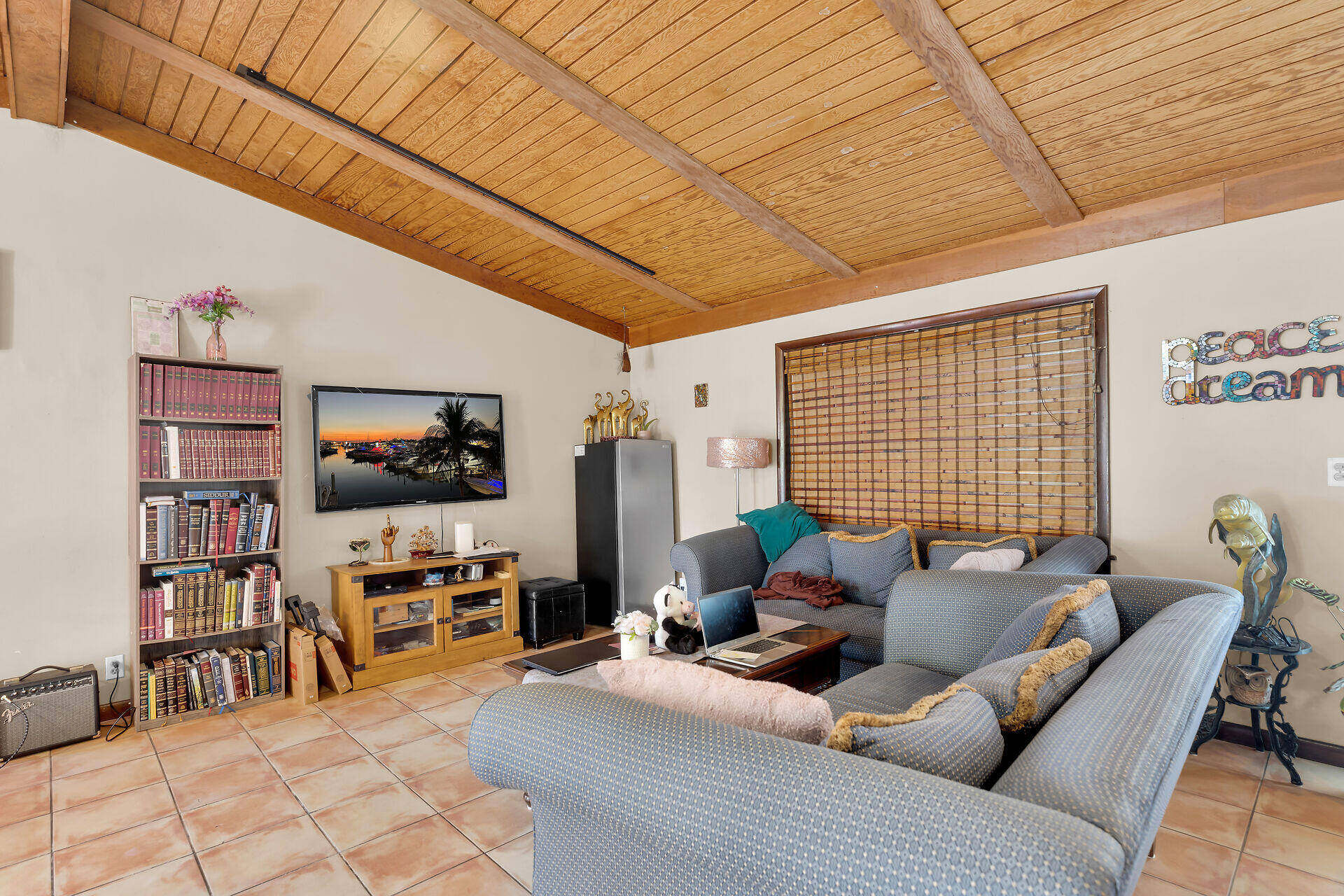 1614 Dennis Street Key West, FL 33040 - Photo 43 of 59 a living room with furniture and a flat screen tv